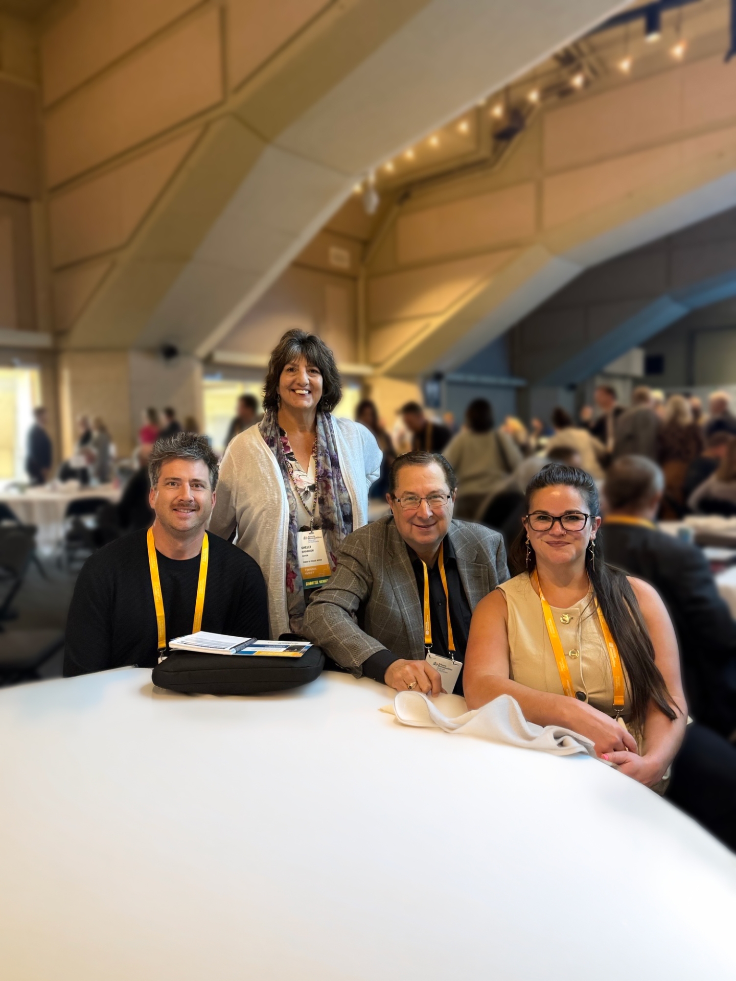 Mayor Shannon, Councillor Erickson, Councillor Forsythe, and CAO Parsons around a table at the 2026 ABMuni's conference